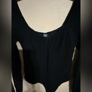 Body suits size medium one black & one white